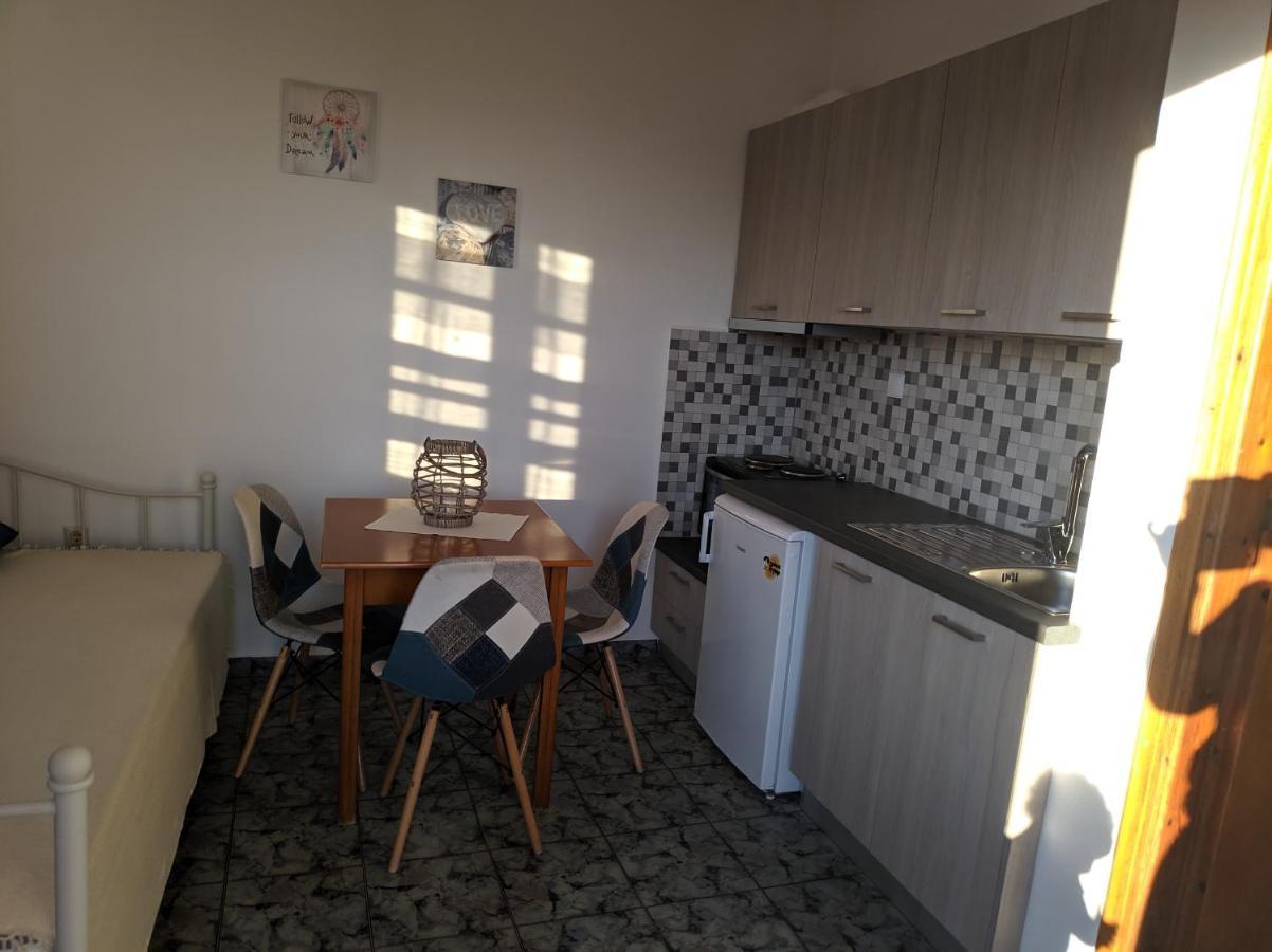 Apartamento Tramonto Nel Delfini Kini Exterior foto