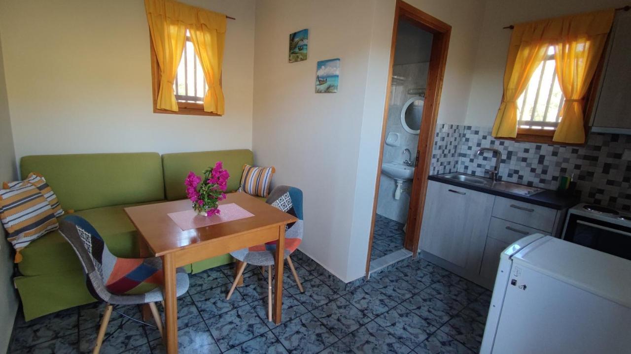 Apartamento Tramonto Nel Delfini Kini Exterior foto